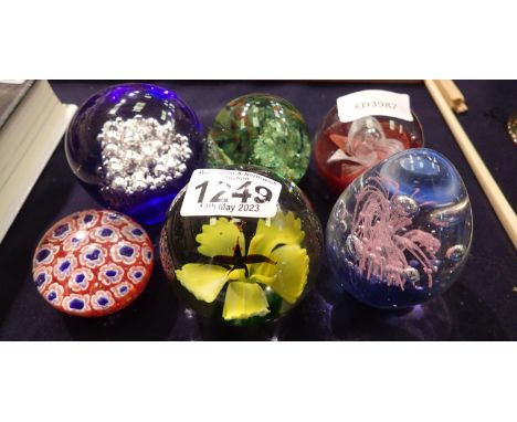 Six glass paperweights including a millefiori example. P&amp;P Group 2 (£18+VAT for the first lot and £3+VAT for subsequent l