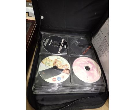 Collection of mixed CDs in a travel case. P&amp;P Group 2 (£18+VAT for the first lot and £3+VAT for subsequent lots) 