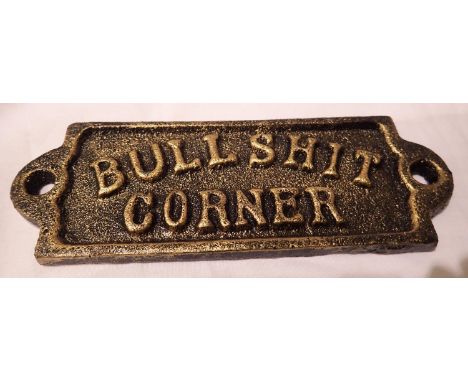 Cast iron bronzed Bull**** corner plaque, W: 10 cm. P&amp;P Group 1 (£14+VAT for the first lot and £1+VAT for subsequent lots