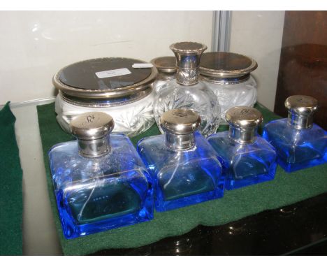 Silver topped graduated scent bottles and others