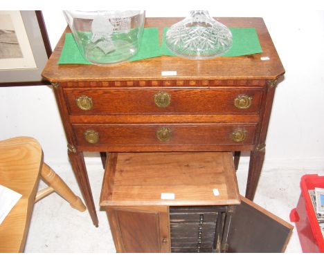 An antique two drawer side table 