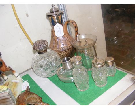 Silver topped scent bottles etc.