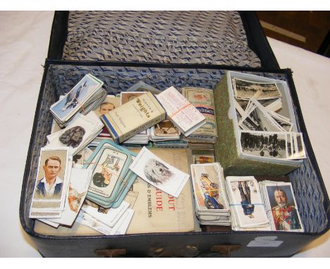 A case of collectable cigarette cards - various subjects