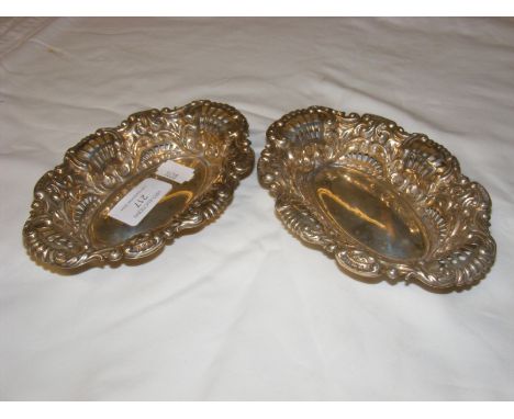 A pair of silver bon bon dishes