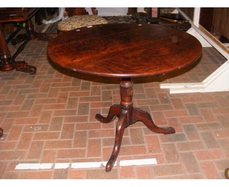 A Georgian snap-top tripod table - 90cm diameter