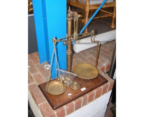 A pair of antique scales with weights