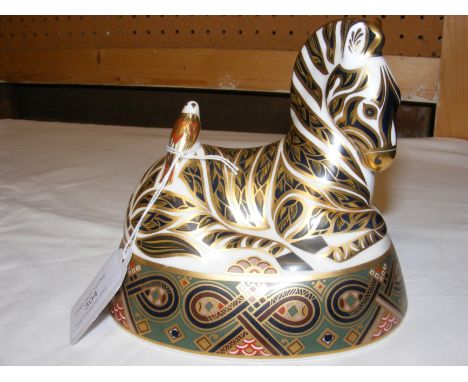 A Royal Crown Derby paperweight in the form of a zebra (exclusively made for Harrods)