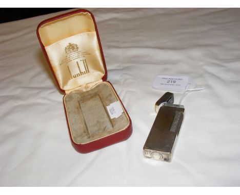 A vintage Dunhill lighter with original box