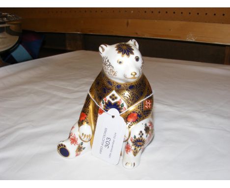 A Royal Crown Derby paperweight in the form of a bear