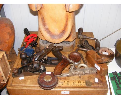 A selection of old vintage tools, including Stanley wood planes  