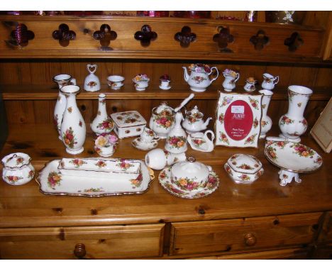 A quantity of Royal Albert 'Old Country Roses' china, including vases, trinket dishes and ornaments 