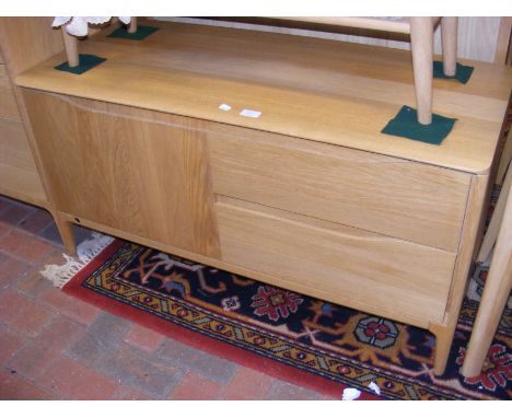 A contemporary Ercol 'Romana' TV cabinet with cupboard and two drawers - width 108cm