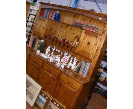 A lacquered pine kitchen dresser with four cupboards below - width 173cm 