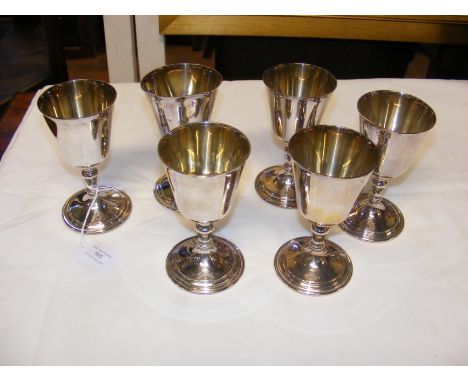 A set of six silver wine goblets