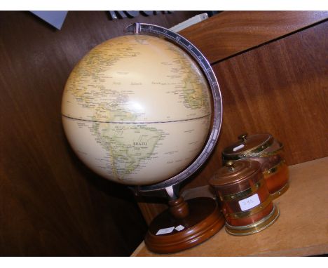 An antique effect desk globe, together with two copper and brass bound jars 