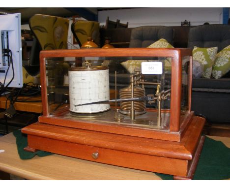 A barograph in mahogany case