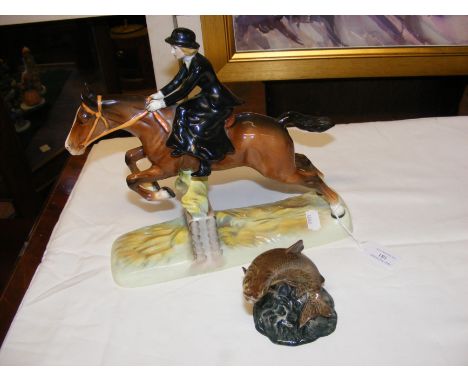 A Beswick ceramic horse jumping ornament - 26cms high, together with a Beswick trout CONDITION REPORT We have attached a numb