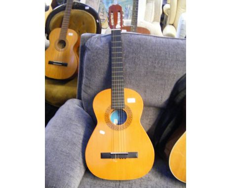 A Spanish BM Clasico six string acoustic guitar