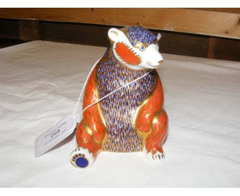 A Royal Crown Derby paperweight in the form of a bear