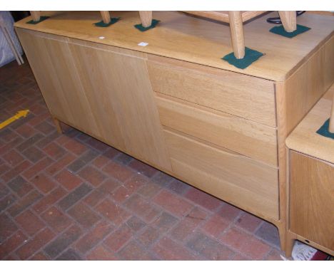 A contemporary Ercol 'Romana' sideboard with two door cupboard and three drawers - width 160cm