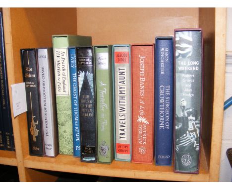 A selection of Folio Society fiction books, including 'Travels With My Aunt' by Graham Greene 