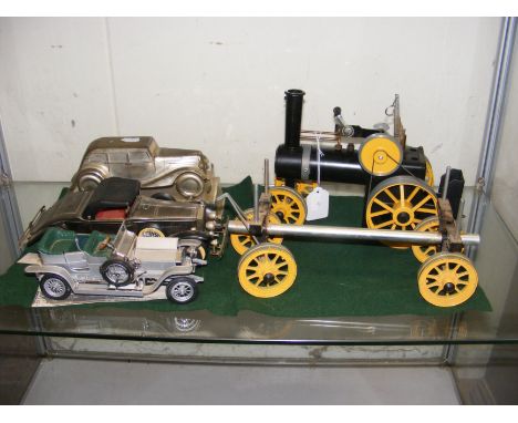 A Mamod style steam engine together with model cars