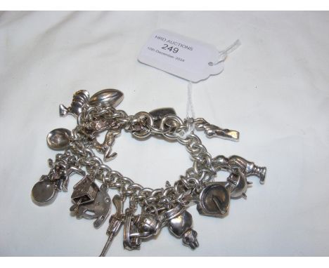 A heavy silver charm bracelet