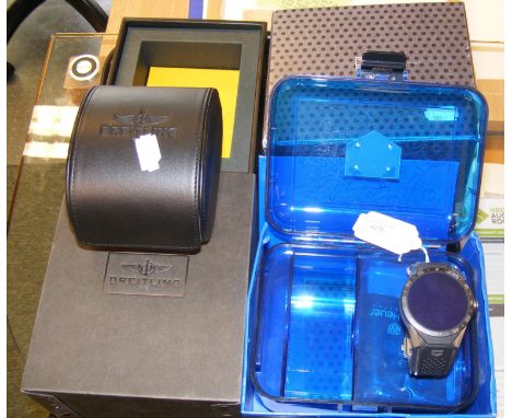 A Tag Heuer gents digital wrist watch with box and paperwork, together with a Breitling box and case onlyCONDITION REPORTwe h