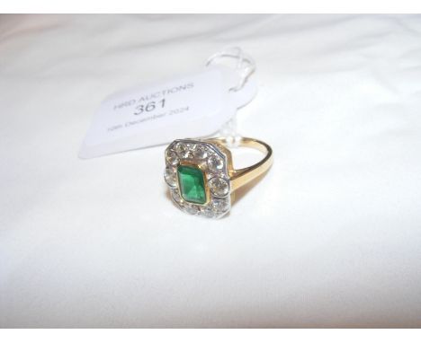 An 18ct diamond and emerald ring CONDITION REPORT We have attached a number of additional images to showcase the lot in furth