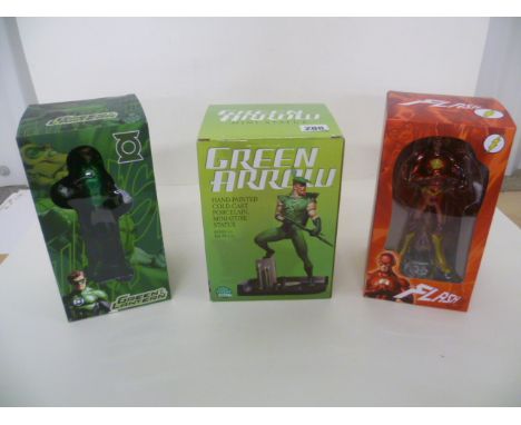 Three boxed figures comprising of DC Direct Green Arrow hand painted cold-cast porcelain miniature statue, Crazy Toys Green L