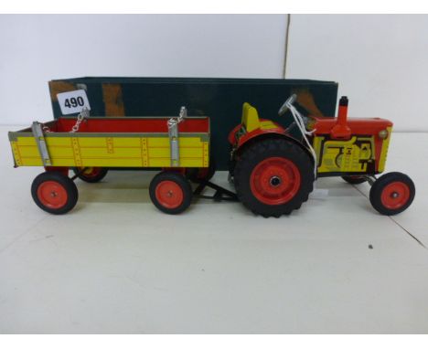 Boxed Schylling tin plate clockwork wind up Tractor and Trailer with key