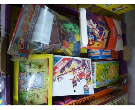 Collection of mixed vintage toys including boxed clockwork rabbits, boxed Model Toys Action Packs Arabs, boxed Noddy Plastici