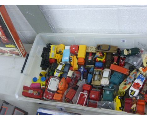 Collection of vintage play worn die-cast, plastic and tin plate vehicles including various models, approximately 54