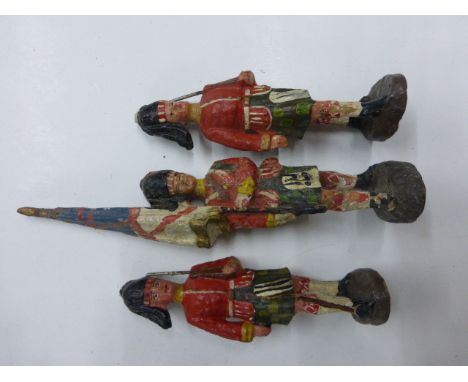 Three original Elastolin Guardsmen figures 