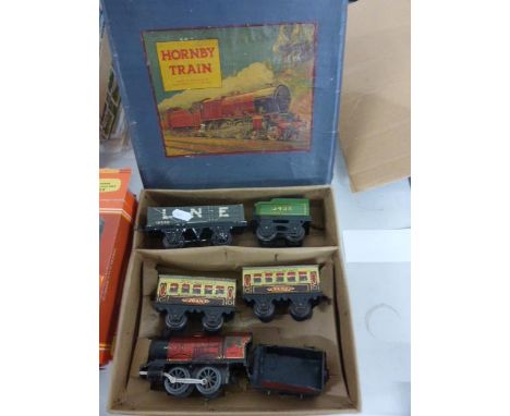 Boxed O gauge Hornby M O Passenger clockwork train set with engine & tender, two carriages, wagon and additional tender, no t