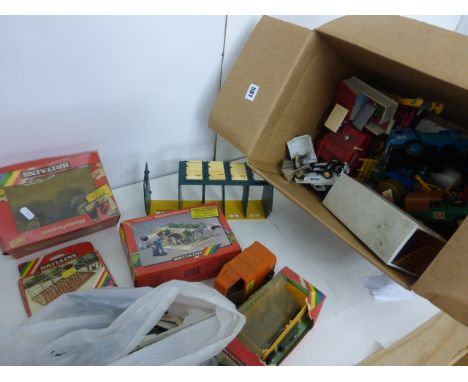 Quantity of Britains vehicles and accessories mainly farming including 4 x boxed (4710 Milking Parlour, 1716 Animal Pens, 951