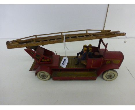 Vintage tin plate clockwork fire engine, rusting but gd overall