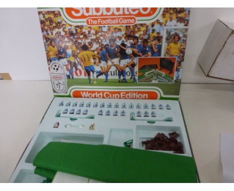 Boxed Subbuteo World Cup 90 edition with Argentina & Italy teams, one player missing, one corner kick taker broken otherwise 