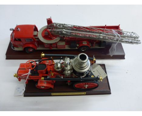 Two Franklin Mint Fire Engines on wooden stands including 1912 Christie Front Drive Steamer and 1954 American La France Fire 