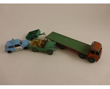 Four vintage Dinky die-cast vehicles including Land Rover, 341 Trailer, Supertoys Foden and Mini Clubman 'Police' (play worn)