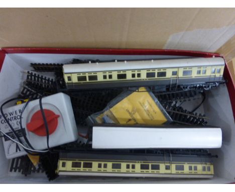 Small group of OO gauge model railway including three coaches, Airfix GWR Tank Engine (a/f), track etc