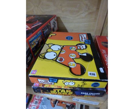 Two Character chess sets comprising Star Wars & Simpsons, items in good condition, boxes with some tears and creasing  