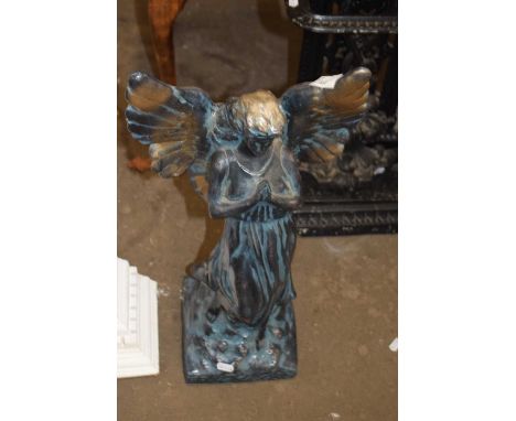 Bronze effect model of an angel