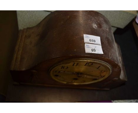 Early 20th Century mantel clock in domed case with applied carved detail