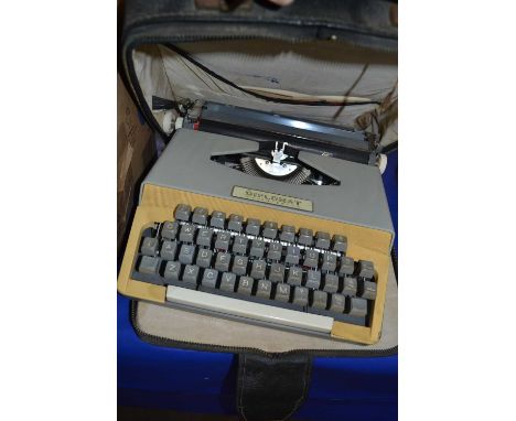 Box of assorted Kodak slides together with a vintage typewriter