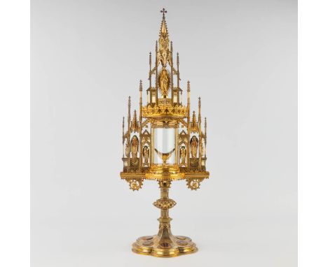 A large Tower Monstrance, gilt brass in a gothic revival style. Probably Bourdon, Ghent. Richly decorated with cabochons, gla