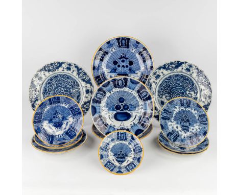 12 plates 'Peacock' or 'Pauwstaart', Delft, 18th C.&nbsp;Most of them are marked: De Klaauw,&nbsp;L.P.K (De Lampetkan), De Dr