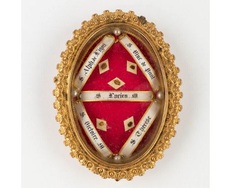 A sealed Theca with relics of Alph. De Ligori, S. Vinc De Paul, S. Lucien M. S. Victoire M., S Therèse.&nbsp;You are buying t