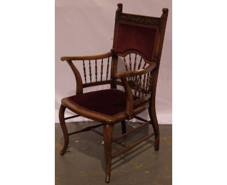 A late Victorian elbow chair with turned and carved frame, impressed M or W to underside, legs/arms solid, back solid no crac