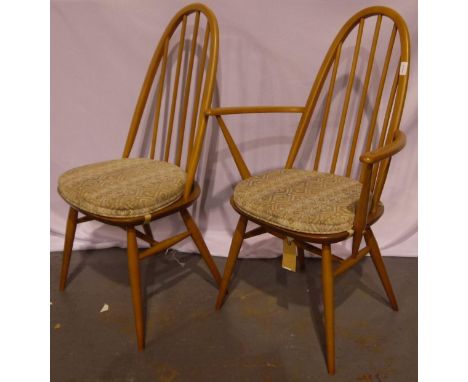 A set of six (4+2) Ercol Windsor stick-back dining chairs with upholstered seat cushions. All six chairs are in very well pre